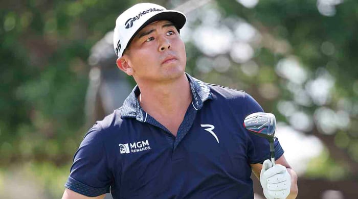 Kurt Kitayama watches a shot at the 2023 Arnold Palmer Invitational.